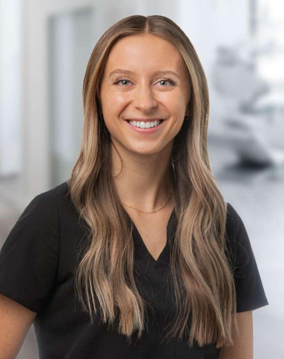 Becca, dental team member, smiling at Salt Lake City dental practice.