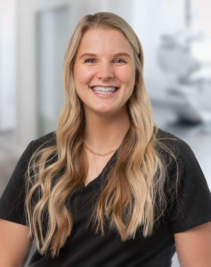 Shanelle, a smiling dental team member at Salt Lake City dental practice.