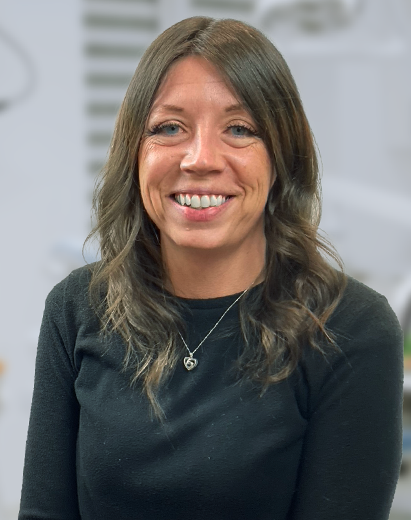 Tara, dental professional at Highland Drive practice in Salt Lake City, smiling.