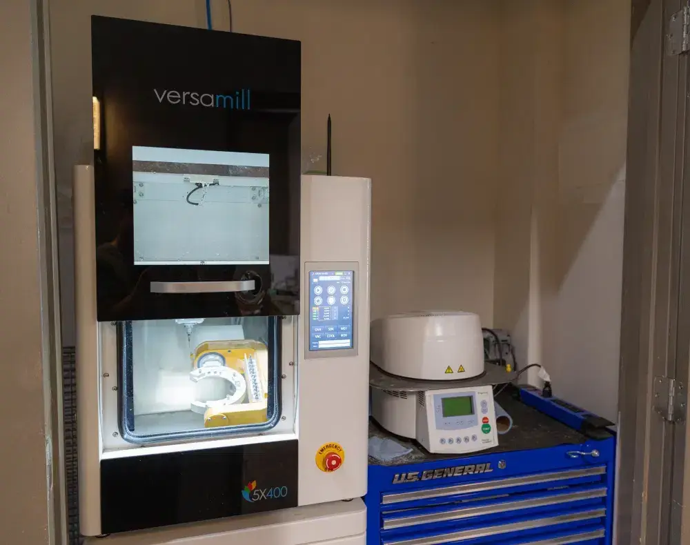Dental sterilization equipment including Veramill 5X400 mill and laboratory devices on display in Salt Lake City dental offi.